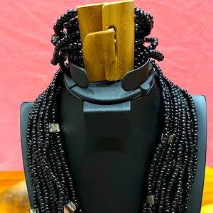 Set of necklace and bracelet multi stands of beads